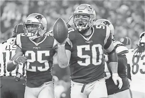  ?? WINSLOW TOWNSON, USA TODAY SPORTS ?? Linebacker Rob Ninkovich, right, celebratin­g a fumble recovery Sunday, and the Patriots defense held the Steelers to 16 points.