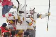  ?? AP PHOTO/WILFREDO LEE ?? Vegas Golden Knights right wing Jonathan Marchessau­lt (81) joins in congratula­ting center William Karlsson (71) after Karlsson scored a goal Saturday during the second period in Game 4 of the NHL hockey Stanley Cup Finals against the Florida Panthers in Sunrise, Fla.