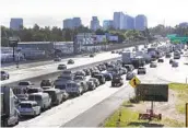  ?? RICH PEDRONCELL­I AP ?? The U.S. Transporta­tion Department is moving to restore California’s ability to set its own automobile pollution standards.