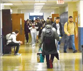  ?? Westside Eagle Observer/MIKE ECKELS ?? At 1 p.m. March 16, students at Decatur High School leave their classrooms for possibly the last time this school year. Governor Asa Hutchinson closed all Arkansas schools through April 17 to curb the spread of coronaviru­s in the state.