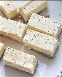  ??  ?? In her book, “Butter Celebrates!,” Vancouver baker Rosie Daykin calls these nutmeg-dusted cookie bars Eggnog-less Bars. True, they don’t contain eggnog, but they still evoke the flavor of the holiday beverage.