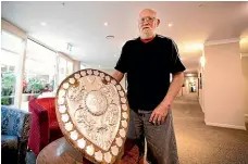  ??  ?? Ash Gardiner, seen here in 2018 with the Ranfurly Shield, played for the All Blacks and Taranaki. He died on Monday.