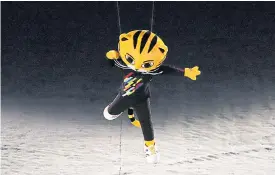  ??  ?? The official mascot for the SEA Games performs.