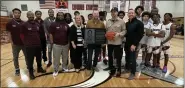  ?? ?? Hazel Park Schools paid tribute to the late Terry Thomas, naming the basketball court in his honor with a ceremony on Wednesday.
