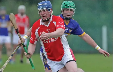  ??  ?? Shane Kehoe of Monageer-Boolavogue under pressure from Conal Grant (St. Mary’s, Rosslare).