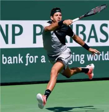  ?? — AFP ?? Argentina’s Juan Martin Del Potro in action against Roger Federer of Switzerlan­d in their BNP Paribas Open final in Indian Wells, California, on Sunday. Potro won 6- 4, 6- 7 ( 8/ 10), 7- 6 ( 7/ 2).