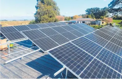  ?? ?? As the price of solar panels and inverter units decrease, AMC Electrical branch manager Geoff France expects demand for their installati­on will increase.