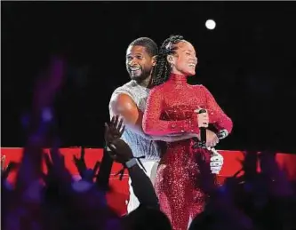  ?? Foto: AFP ?? Halbzeit-Act Usher sang ein Duett mit Alicia Keys.