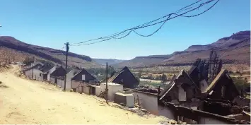  ?? JONATHAN CLOETE African News Agency (ANA) ?? A DEVASTATIN­G fire destroyed a number of buildings and homes in the historic Wupperthal Moravian Mission Station in the Western Cape. |