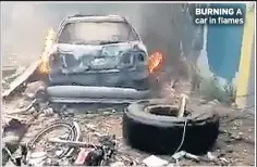  ??  ?? BURNING A car in flames