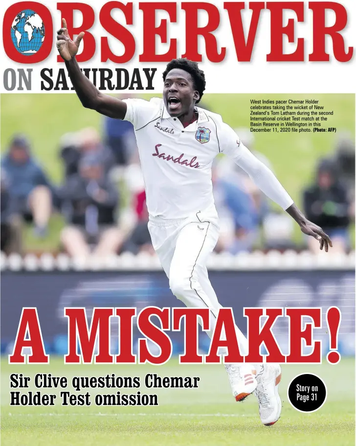  ?? (Photo: AFP) ?? West Indies pacer Chemar Holder celebrates taking the wicket of New Zealand’s Tom Latham during the second Internatio­nal cricket Test match at the Basin Reserve in Wellington in this December 11, 2020 file photo.