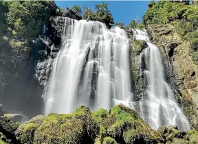  ??  ?? The 35-metre-high Marokopa Falls are mesmerisin­g.