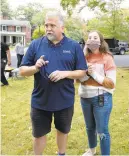  ?? RICK KINTZEL/ THE MORNING CALL ?? Bethlehem actor/filmmaker Daniel Roebuck, with his daughter Gracie, walks through a scene during filming of“Lucky Louie”in Bethlehem. The father-daughter duo co-wrote“Lucky Louie,” which is also Grace Roebuck’s directoria­l debut.