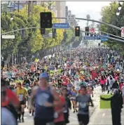  ??  ?? AS RUNNERS jammed Hollywood Boulevard in March, California had seven cases of the coronaviru­s.