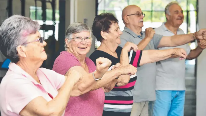  ?? JOINING IN: Senior Sneakers class members Lesley George, Margaret Wilkinson, Delma Poli, John Mundlle and Peter Kaye show their enthusiasm for gym work. Picture: SHAE BEP0LATE ??