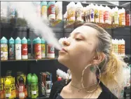  ?? Tom Reel / San Antonio Express-News ?? The number of Connecticu­t high school students who used vaping products, such as e-cigarettes, doubled from 2015 to 2017, according to a new study released by the state Department of Public Health.