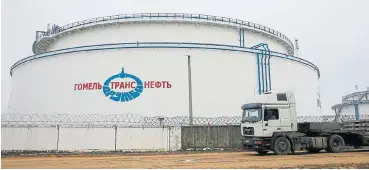  ?? /Reuters ?? Filling up fast: A storage tank at the Gomel Transneft oil pumping station, which moves crude through the Druzhba pipeline westwards to the rest of Europe, near Mozyr, Belarus Oil.