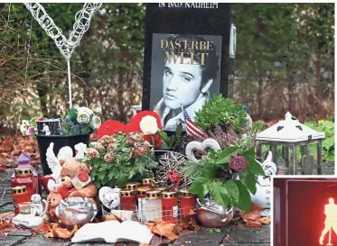 ?? — AP/AFP ?? All lit up:A memorial for Elvis is seen in Bad Nauheim and the traffic light (inset) switching from green to red in Friedberg to remember the rock and roll legend.