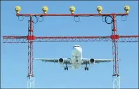  ?? CP PHOTO ?? An Air Canada flight prepares to land at Pearson Internatio­nal Airport in Toronto.