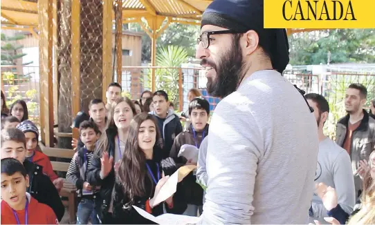  ?? COURTESY OF FORUM FOR DEVELOPMEN­T, CULTURE AND DIALOGUE ?? Children and mothers take part in a nine-day camp on religious dialogue in Latakia, Syria, funded by Canada’s Office of Religious Freedom.