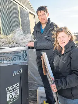  ?? Picture: Duncan Brown. ?? Graham and Ashleigh Thompson filling the recycling bin they are marketing with some of the waste which is collected and baled.