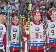  ??  ?? Canada’s men’s relay team of, from left, Brendan Green, Nathan Smith, Christian Gow and Scott Gow celebrate after winning a bronze medal at the World Biathlon Championsh­ips last March.