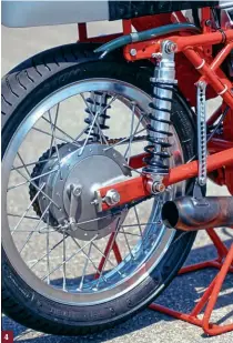  ??  ?? 4: Works Performanc­e gas shocks at the rear, with a twin leading shoe 160mm Grimeca brake. 4