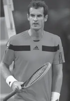  ?? AGENCE FRANCE PRESSE ?? Britain's Andy Murray reacts after losing a point against Germany's Florian Mayer during their tennis match in Qatar's ExxonMobil Open in Doha.