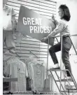  ?? BURR LEWIS ?? Sears was forced to slash prices as competitio­n grew among department stores.