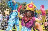  ?? PAM KRAGEN U-T ?? Animal Cracker Conspiracy’s Transmythi­cal creatures led children’s parades around Liberty Station.