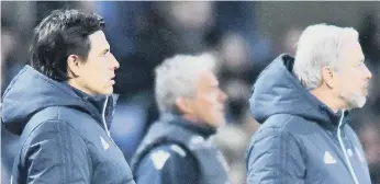  ??  ?? Sunderland boss Chris Coleman and assistant Kit Symons (right) watch Tuesday’s defeat