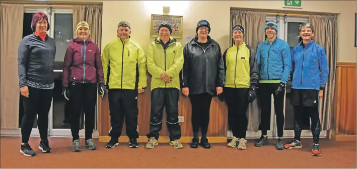  ??  ?? Overcoming the first hurdle, these runners – flanked by jog leaders Lorna and Gordon – have all become the first group of beginner runners who have graduated from the Arran Pace Makers group.