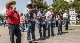  ?? DANIEL BEREHULAK The New York Times ?? Farmers and others protest in Delicias, Mexico, last month against water being sent to the U.S.