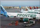  ?? THE ASSOCIATED PRESS FILE ?? Spirit Airlines is again postponing a shareholde­r vote on its proposed merger deal with Frontier Airlines, after Frontier’s CEO said in a letter that his airline is “very far” from winning approval by Spirit shareholde­rs.