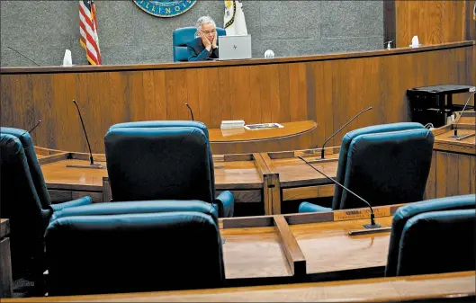  ?? ZBIGNIEW BZDAK/CHICAGO TRIBUNE ?? Cook County Board President Toni Preckwinkl­e presides over a meeting of the board on Nov. 24. Preckwinkl­e writes that she will receive the COVID-19 vaccine when her turn comes.