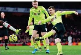  ??  ?? YELLOW PERIL: Fleck levels for Sheffield United seven minutes from full-time