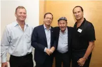  ?? (Itzik Biran) ?? PRESIDENT ISAAC HERZOG and Murray Greenfield, flanked by Ilan Greenfield (left) and Tal Brody.