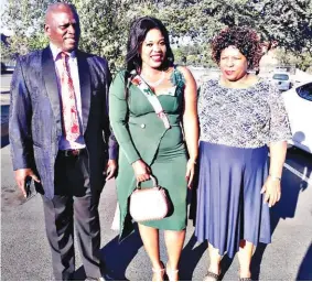  ?? ?? ▲ Rock Engineerin­g trainee Seluliwe Mamba with her parents. They are former Matsanjeni South MP Bomber and Lungile Mamba.