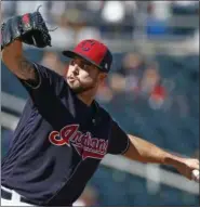  ?? ROSS D. FRANKLIN — THE ASSOCIATED PRESS ?? Cleveland Indians pitcher Ryan Merritt throws against the Cincinnati Reds during the second inning of a spring training baseball game Saturday, in Goodyear, Ariz.