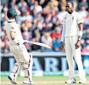  ??  ?? Look here: Jofra Archer blocks the path of Matthew Wade after their verbal confrontat­ion at Old Trafford yesterday