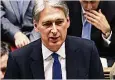  ??  ?? GLOOMY Philip Hammond