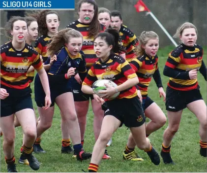  ??  ?? Girl power! Sligo U14 Girls’ captain Xena Morgan, leads the charge, supported by teammates at the weekend.