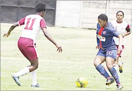  ?? (Pic: Mengameli Mabuza) ?? Mbabane Swallows Ladies winger Mayendziwe Simelane (10) taking on Manzini Wanderers midfielder Nonduduzo Mhlanga in their EWFL game which ended 2-all at the Prince of Wales Sports Ground yesterday.