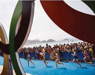  ?? Felipe Dana / Associated Press ?? Akin to cities that pursue the Games, Olympians such as those in Saturday’s women’s triathlon couldn’t be faulted for wanting to run rings around the competitio­n.