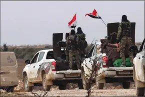  ?? (SANA/Reuters) ?? SYRIAN ARMY soldiers are pictured in the western Aleppo province on Sunday.