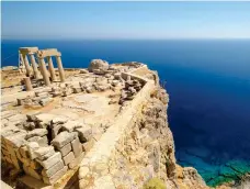  ??  ?? PICTURE PERFECT: Looking out over Oia, Santorini, top; Lindos Acropolis, above; Corfu Town, below