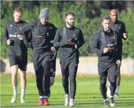  ??  ?? The Tangerines squad at their St Andrews training base.