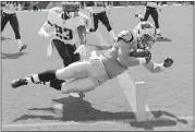  ?? MARK ZALESKI — ASSOCIATED PRESS ?? Carolina Panthers rookie Christian McCaffrey, a former Stanford star, scores on a 17-year run against the Tennessee Titans Saturday in exhibition action.