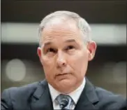  ?? ANDREW HARNIK—THE ASSOCIATED PRESS ?? Environmen­tal Protection Agency Administra­tor Scott Pruitt appears before a Senate Appropriat­ions subcommitt­ee on the Interior, Environmen­t, and Related Agencies on budget on Capitol Hill in Washington. The Environmen­tal Protection Agency reversed...