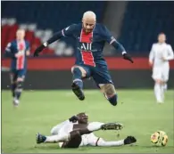  ?? (AFP) ?? Paris Saint-Germain’s Brazilian forward Neymar fights for the ball during the French L1 match against Girondins de Bordeaux (FCGB) at the Parc de Princes stadium in Paris on Sunday.